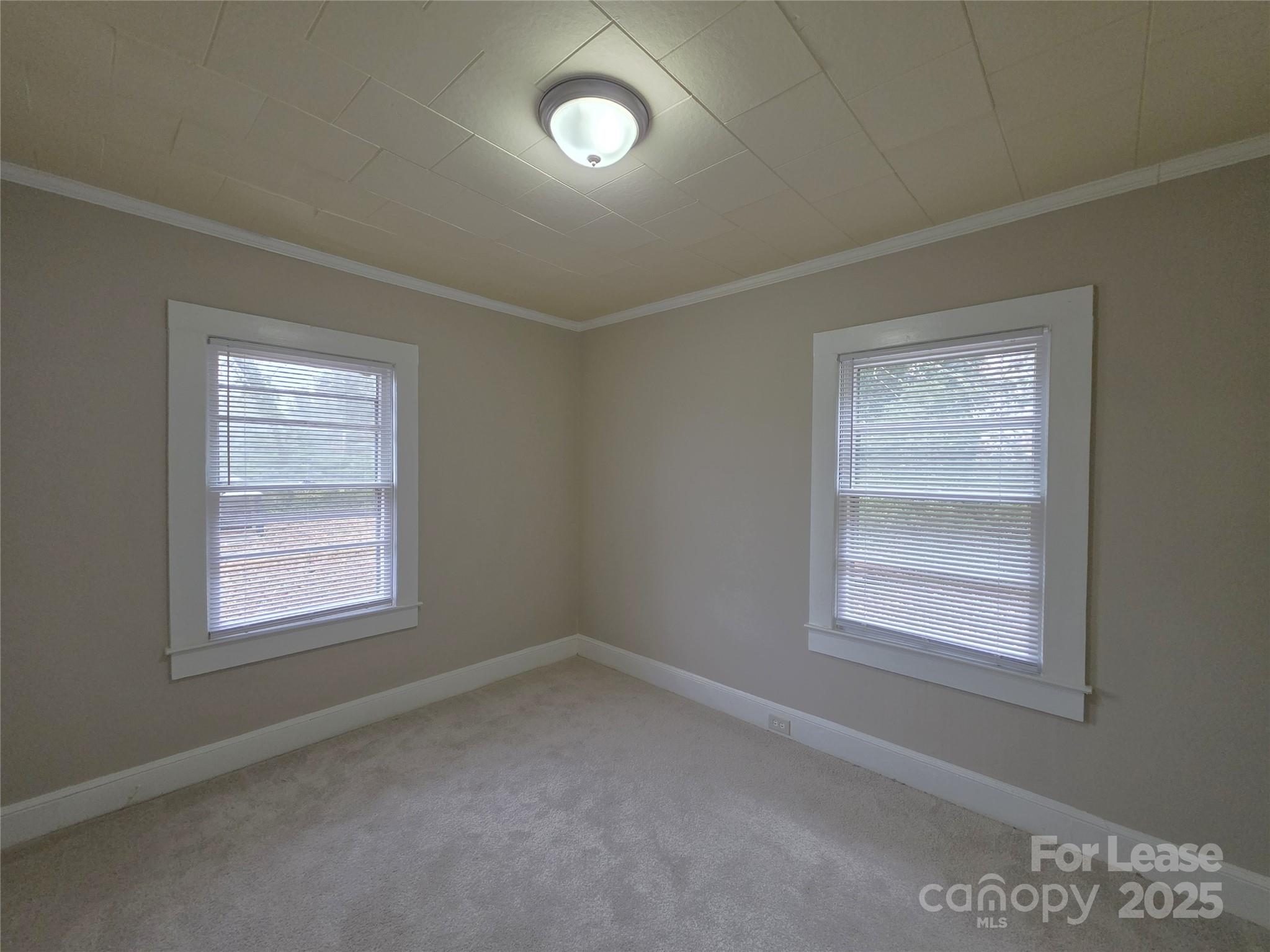 92 Lawndale Avenue Southeast Concord, NC 28025 - Photo 12 of 19 an empty room with a window