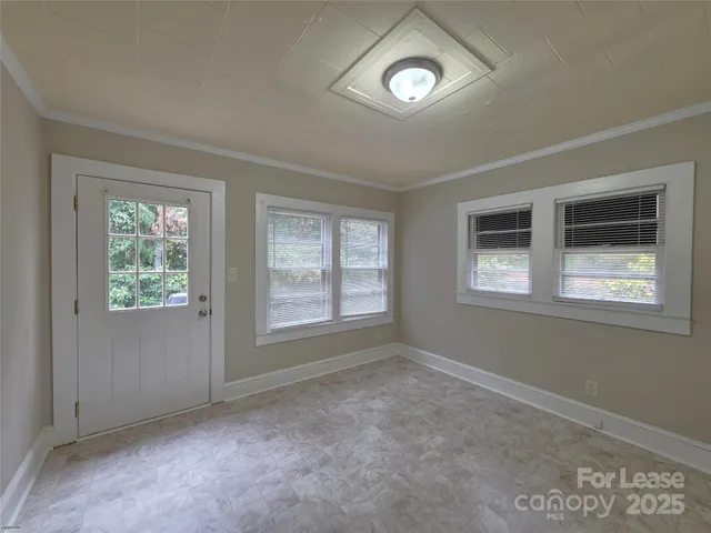 an empty room with windows