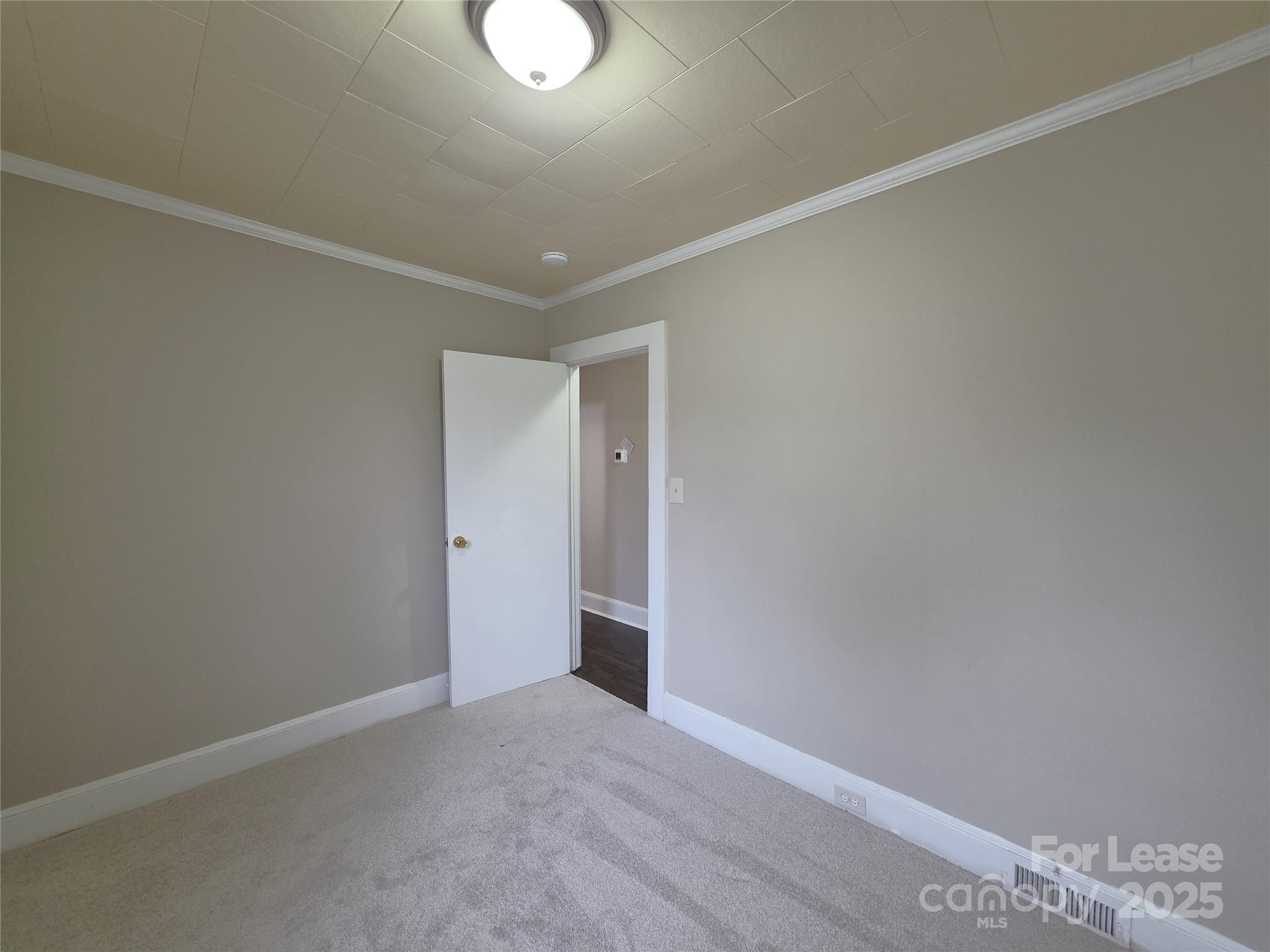 92 Lawndale Avenue Southeast Concord, NC 28025 - Photo 9 of 19 a view of an empty room