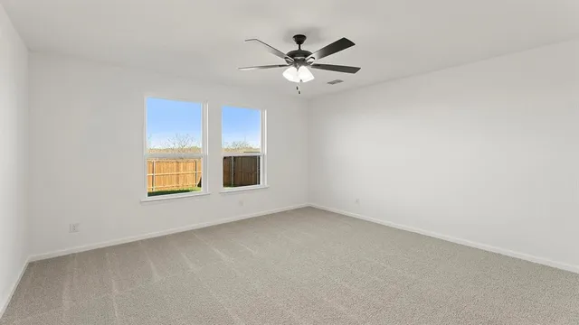 a bathroom with a double vanity sink a mirror and shower