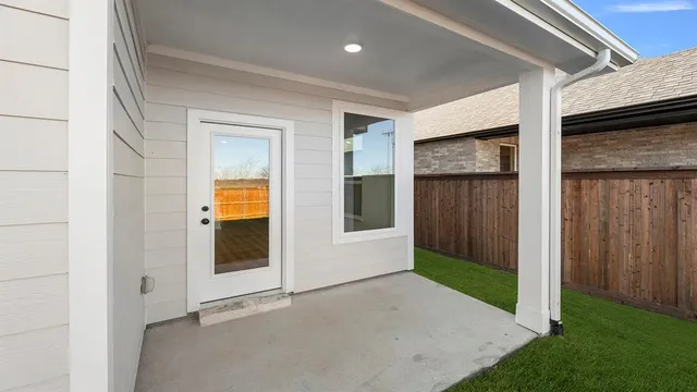 a view of a swimming pool with outdoor seating