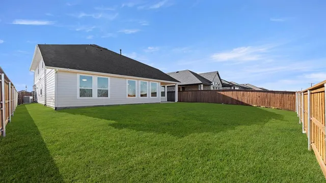 a view of swimming pool with an outdoor seating