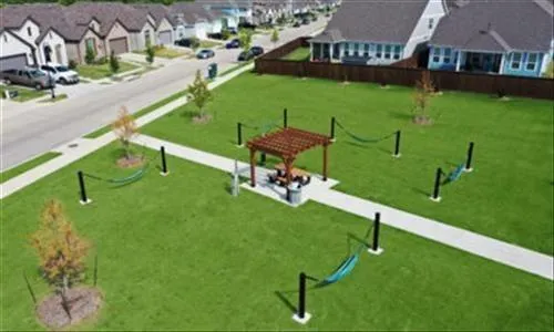 an aerial view of a house with outdoor space