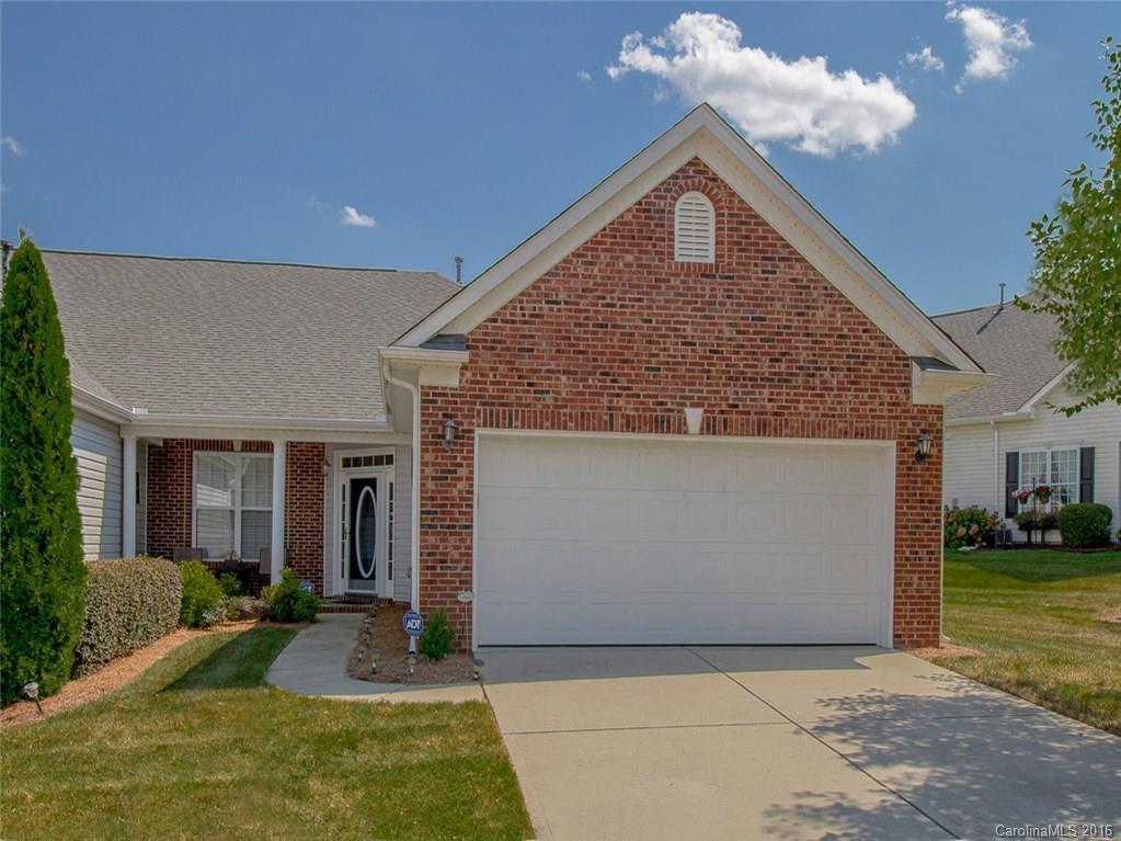 219 Garnet Court, Unit 558 Fort Mill, SC 29708 - Photo 1 of 23 a front view of a house with garden