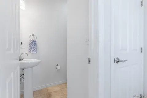 a bathroom with a sink and mirror