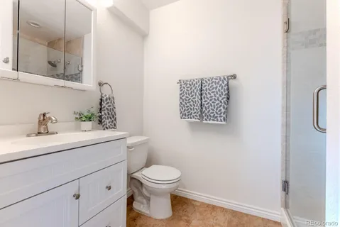 a view of storage and utility room with washer and dryer