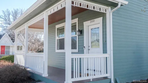 a view of a house with a small yard