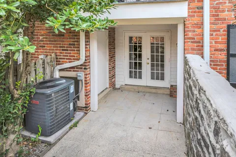 a view of a house with a tree