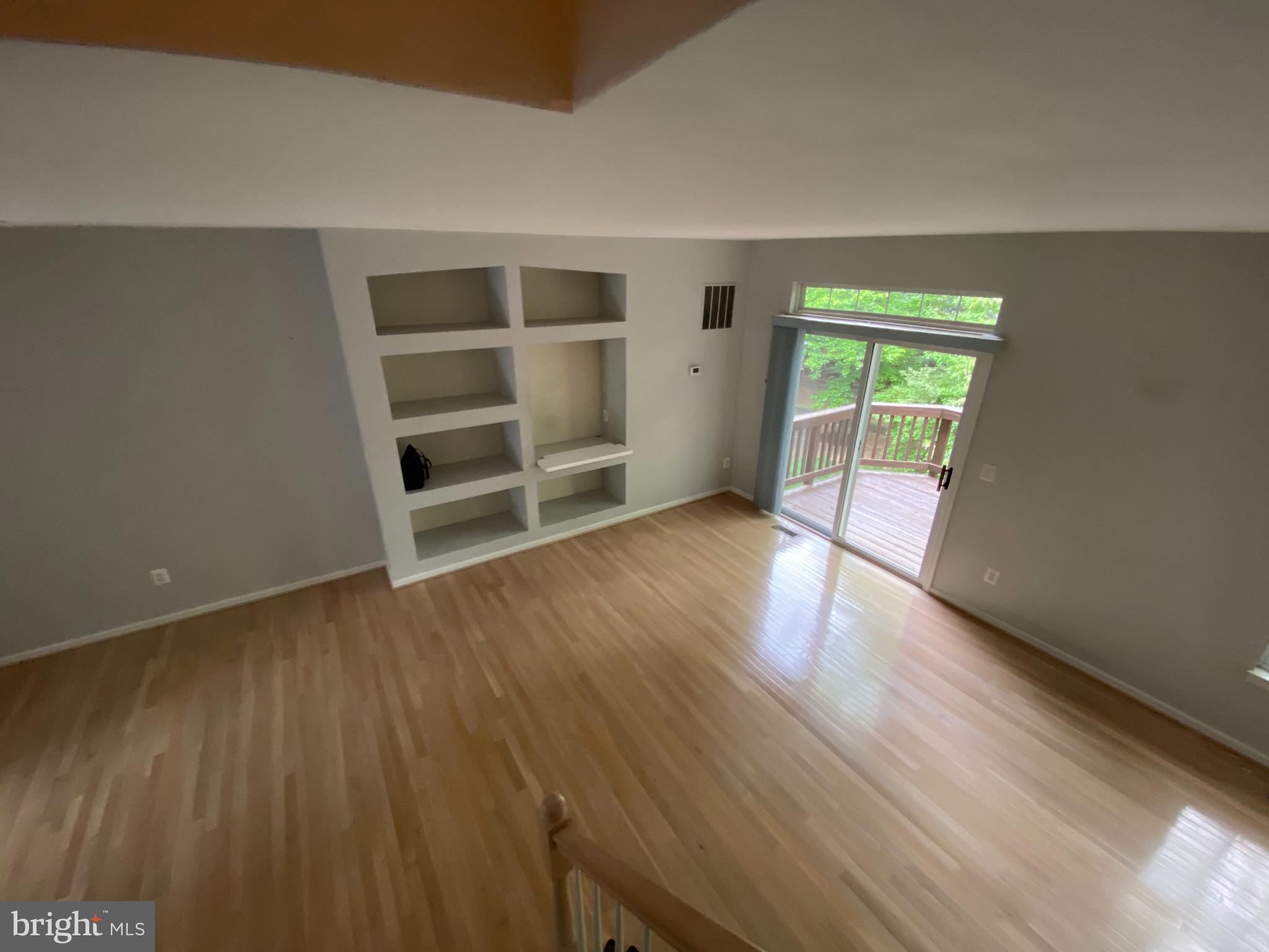 4110 Flower Fairfax, VA 22030 - Photo 11 of 64 wooden floor in an empty room with a window