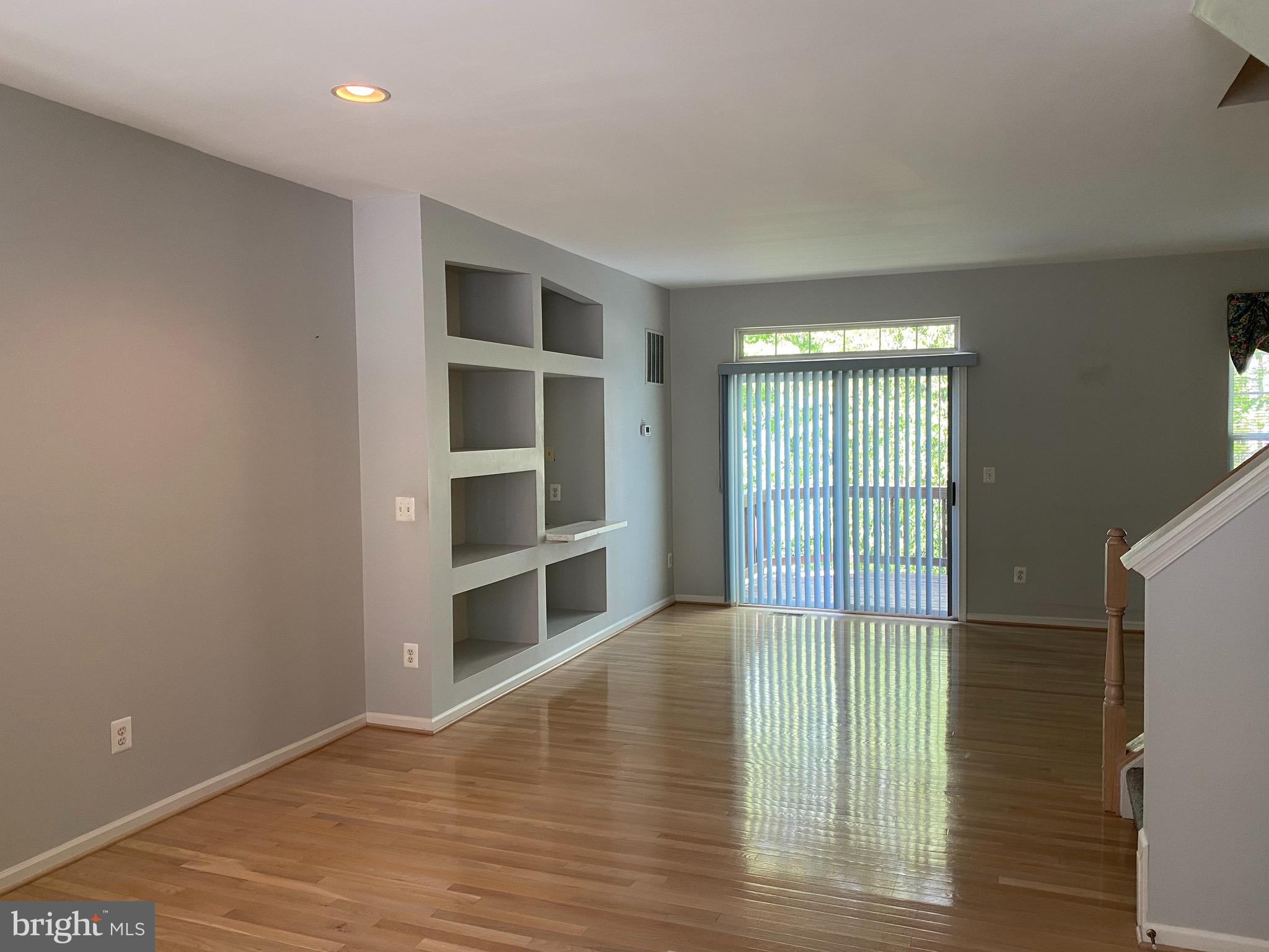4110 Flower Fairfax, VA 22030 - Photo 12 of 64 a view of empty room with wooden floor and fan