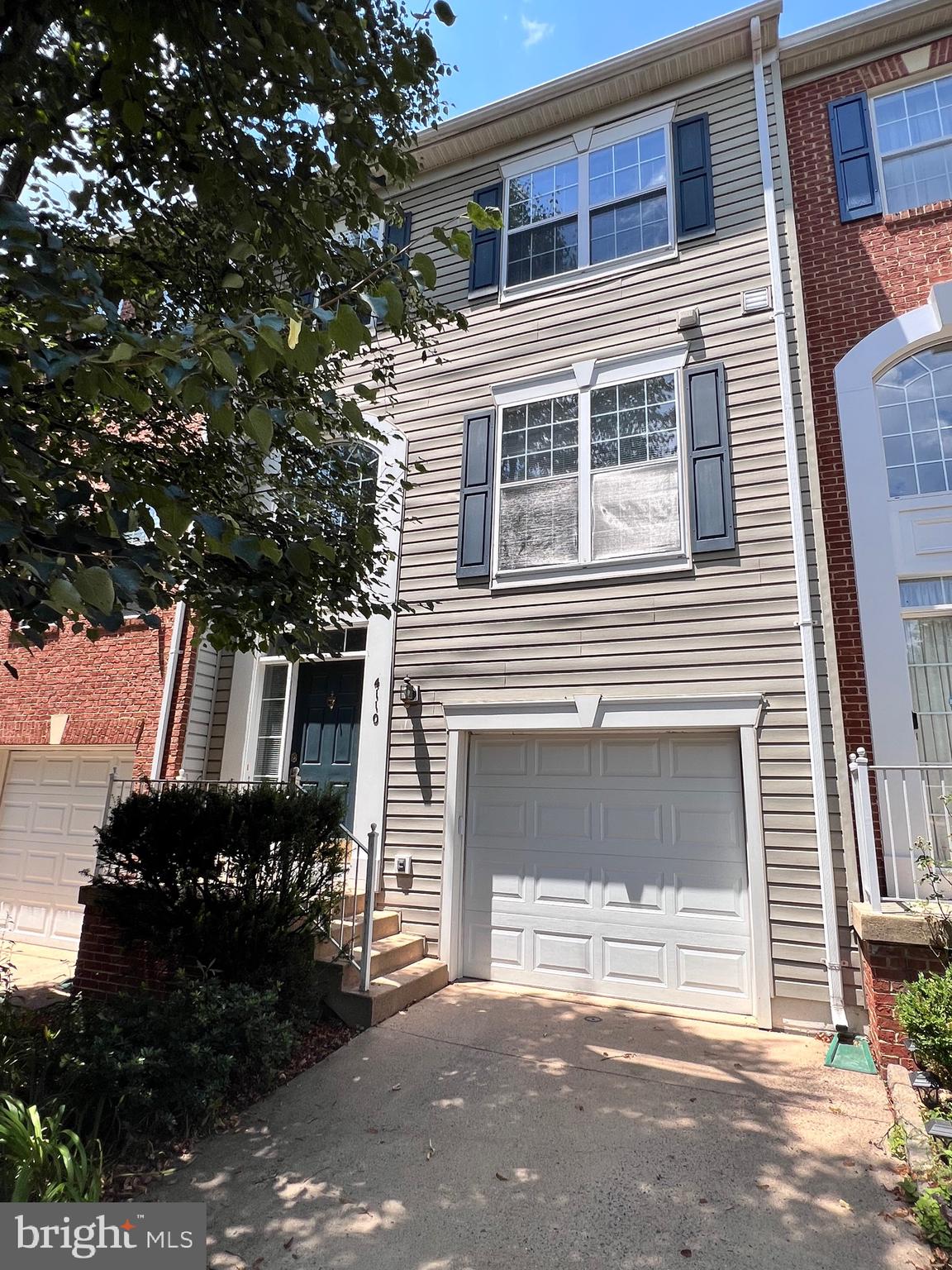 4110 Flower Fairfax, VA 22030 - Photo 34 of 64 a front view of a house with a yard