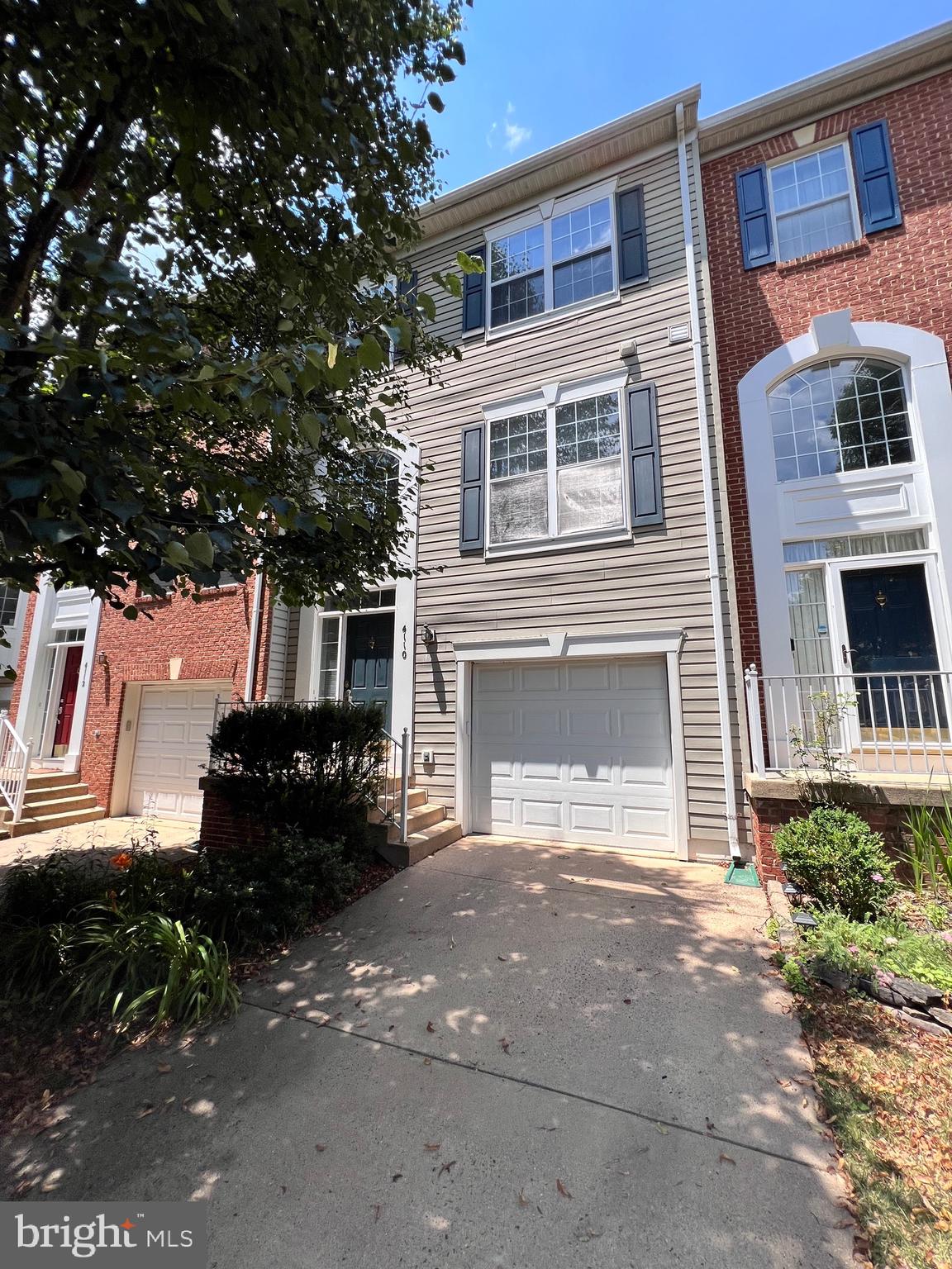 4110 Flower Fairfax, VA 22030 - Photo 35 of 64 a front view of a house with a yard
