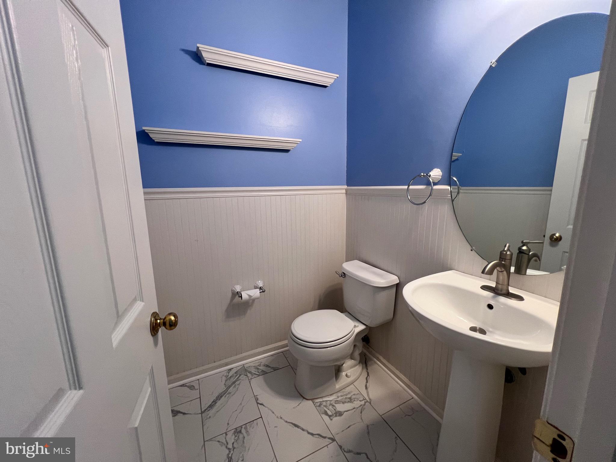 4110 Flower Fairfax, VA 22030 - Photo 37 of 64 a bathroom with a sink toilet and a mirror