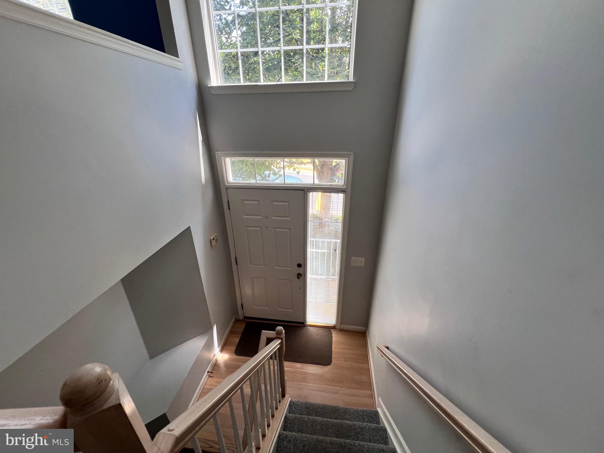 4110 Flower Fairfax, VA 22030 - Photo 39 of 64 a view of a hallway with furniture and wooden floor