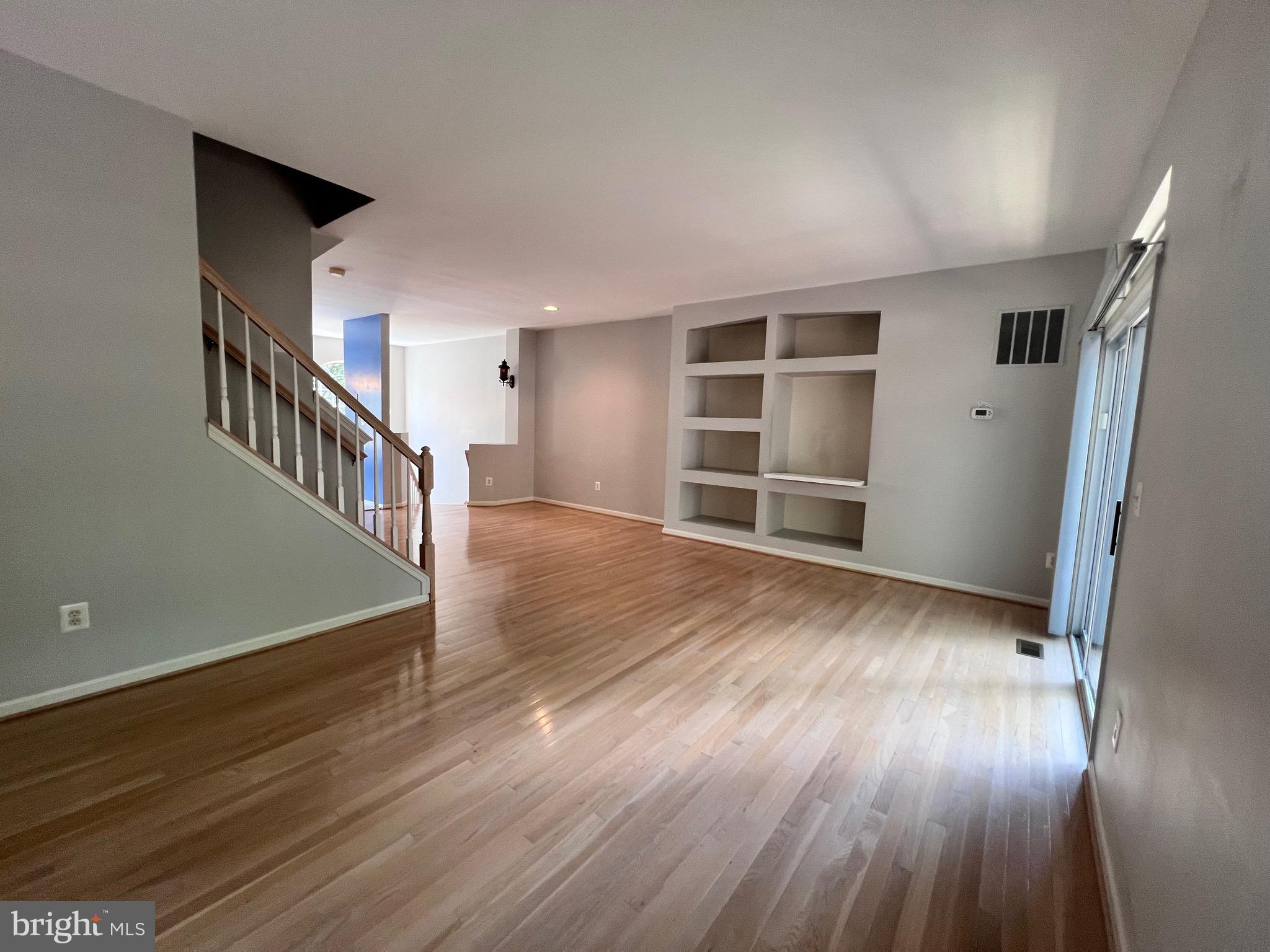 4110 Flower Fairfax, VA 22030 - Photo 51 of 64 a view of empty room with wooden floor and window