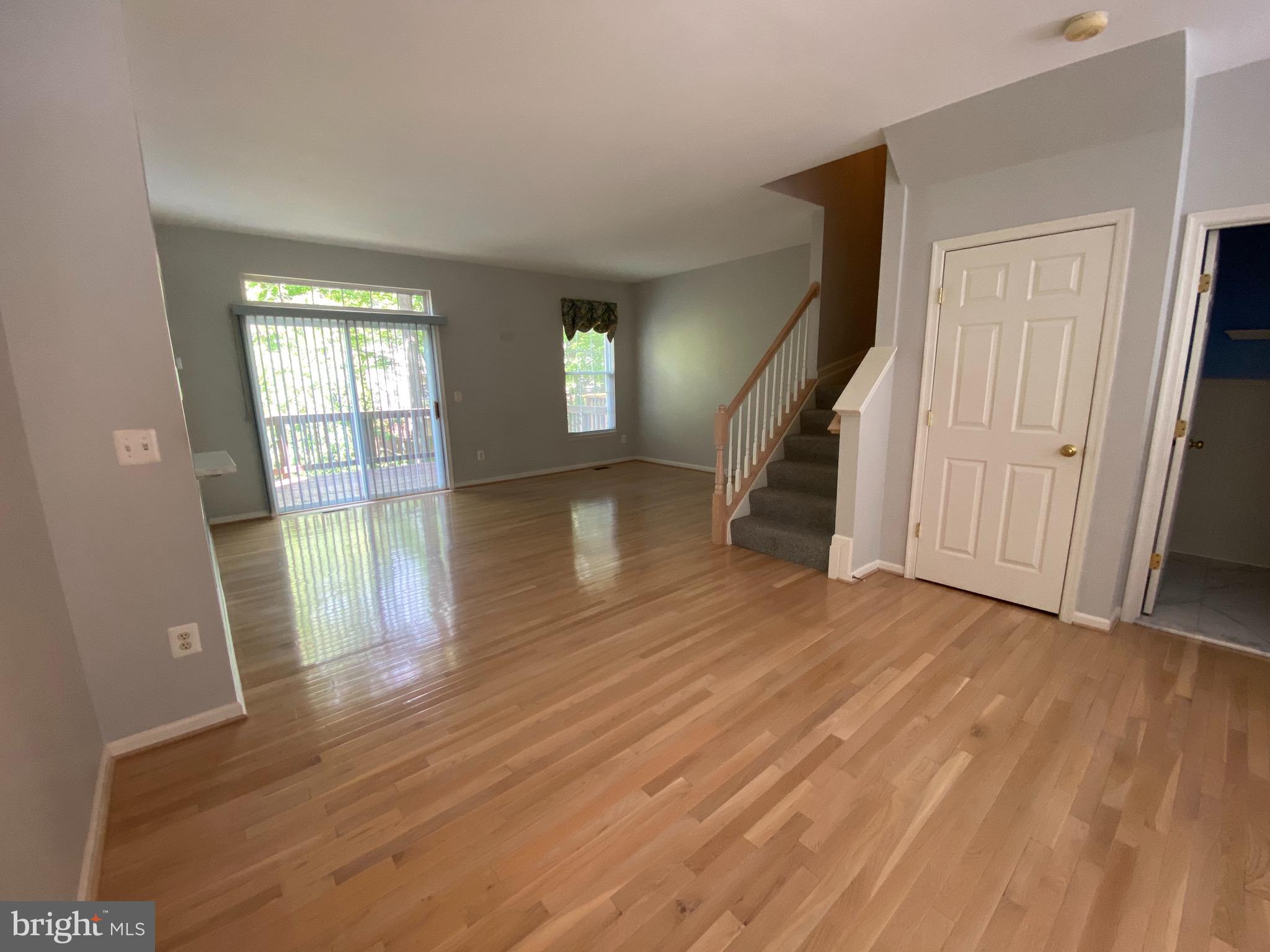 4110 Flower Fairfax, VA 22030 - Photo 10 of 64 an empty room with wooden floor and windows