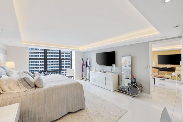 a view of swimming pool from a balcony