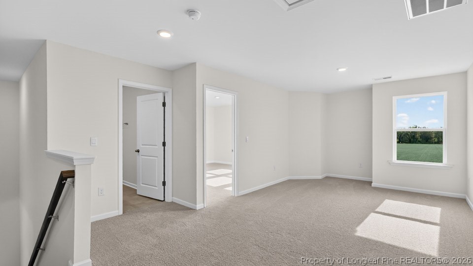 115 Discovery Way Spring Lake, NC 28390 - Photo 12 of 30 a view of an empty room with a window
