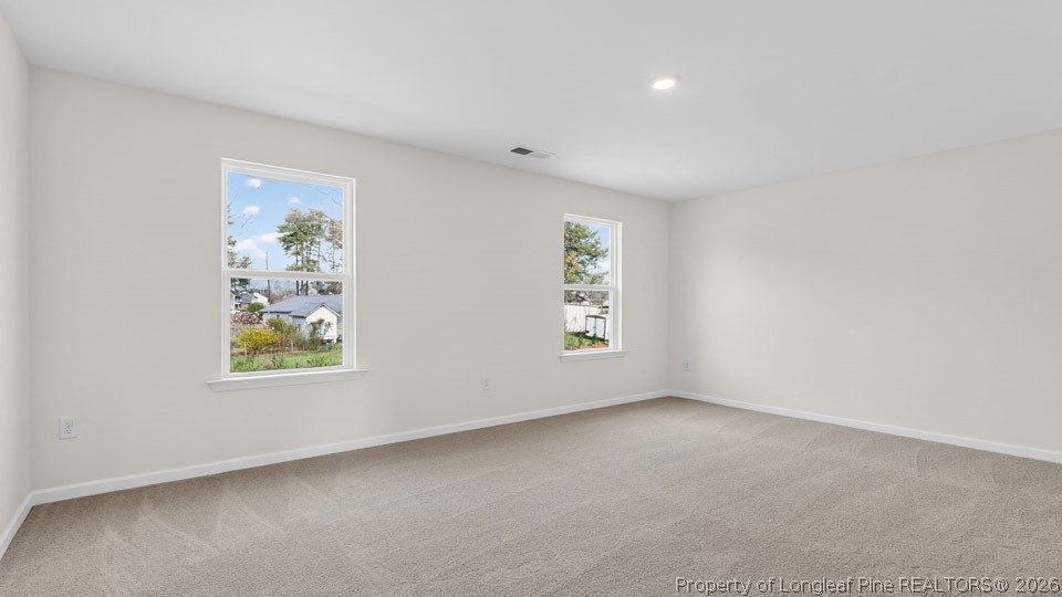 115 Discovery Way Spring Lake, NC 28390 - Photo 16 of 30 an empty room with windows