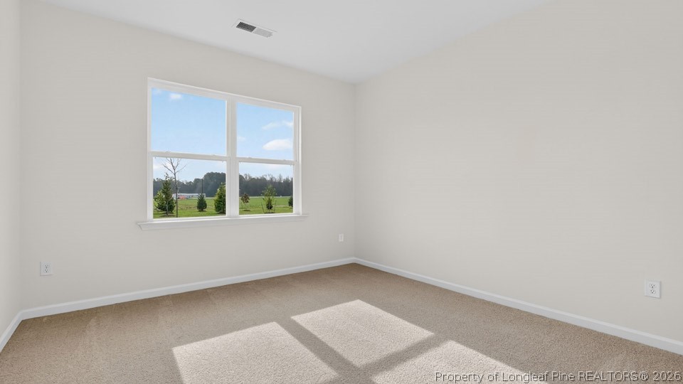 115 Discovery Way Spring Lake, NC 28390 - Photo 18 of 30 an empty room with a window