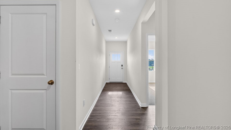 115 Discovery Way Spring Lake, NC 28390 - Photo 2 of 30 a view of a hallway with wooden floor and closet