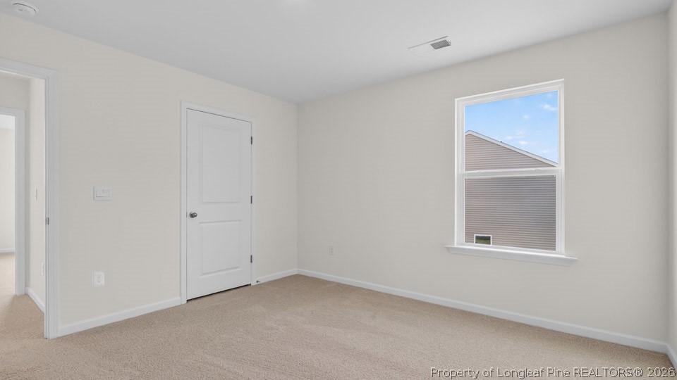 115 Discovery Way Spring Lake, NC 28390 - Photo 21 of 30 an empty room with a window