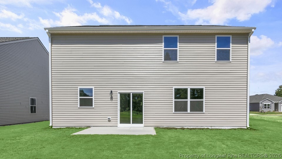 115 Discovery Way Spring Lake, NC 28390 - Photo 28 of 30 a front view of a house with a garden