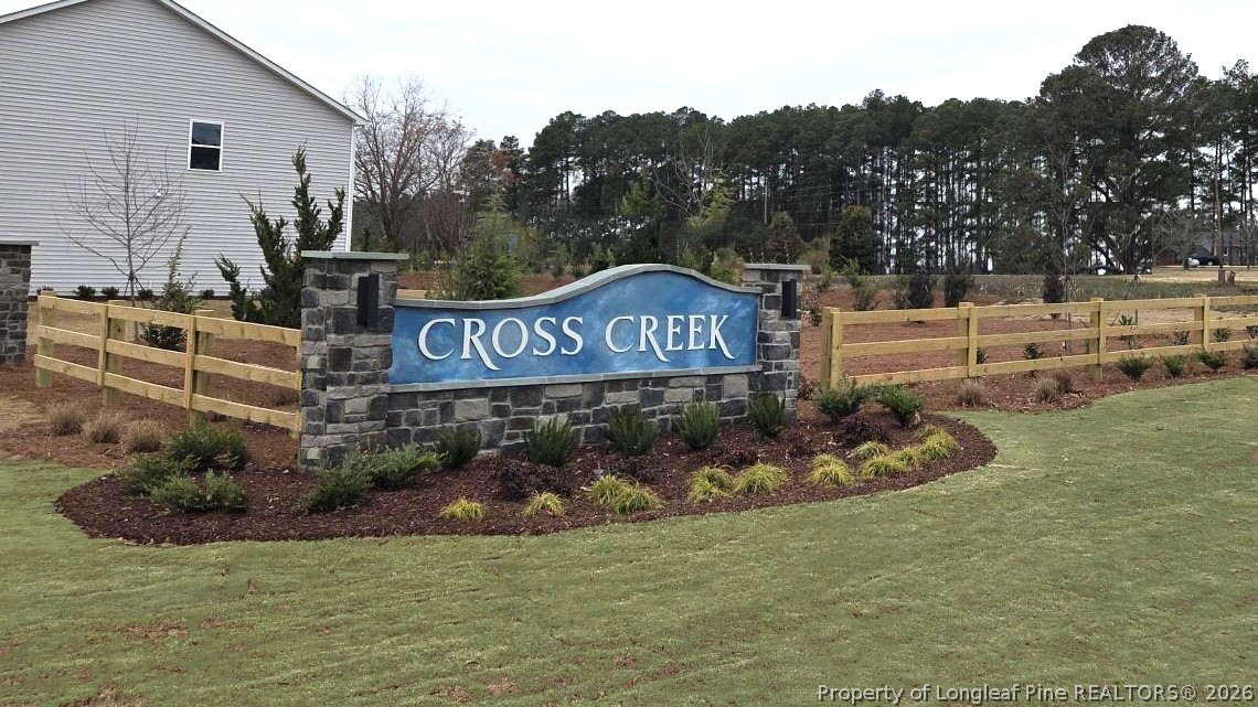 115 Discovery Way Spring Lake, NC 28390 - Photo 30 of 30 a view of outdoor space with garden and trees