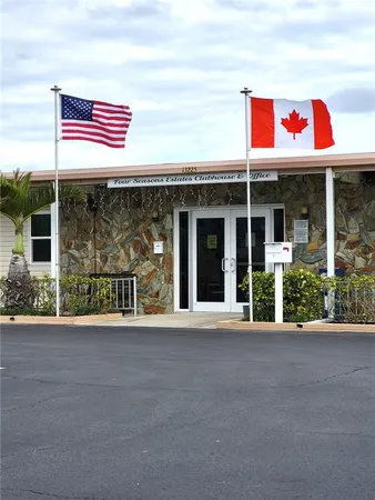 a front view of building with yard