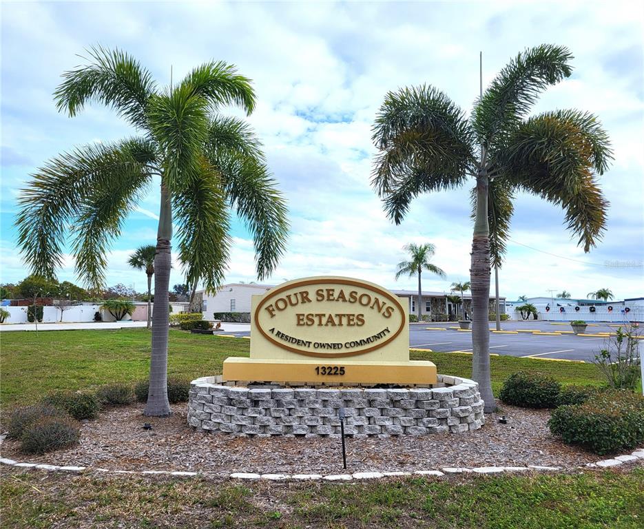 13225 101st Street Southeast, Unit 144 Largo, FL 33773 - Photo 33 of 33 a view of outdoor space with palm tree