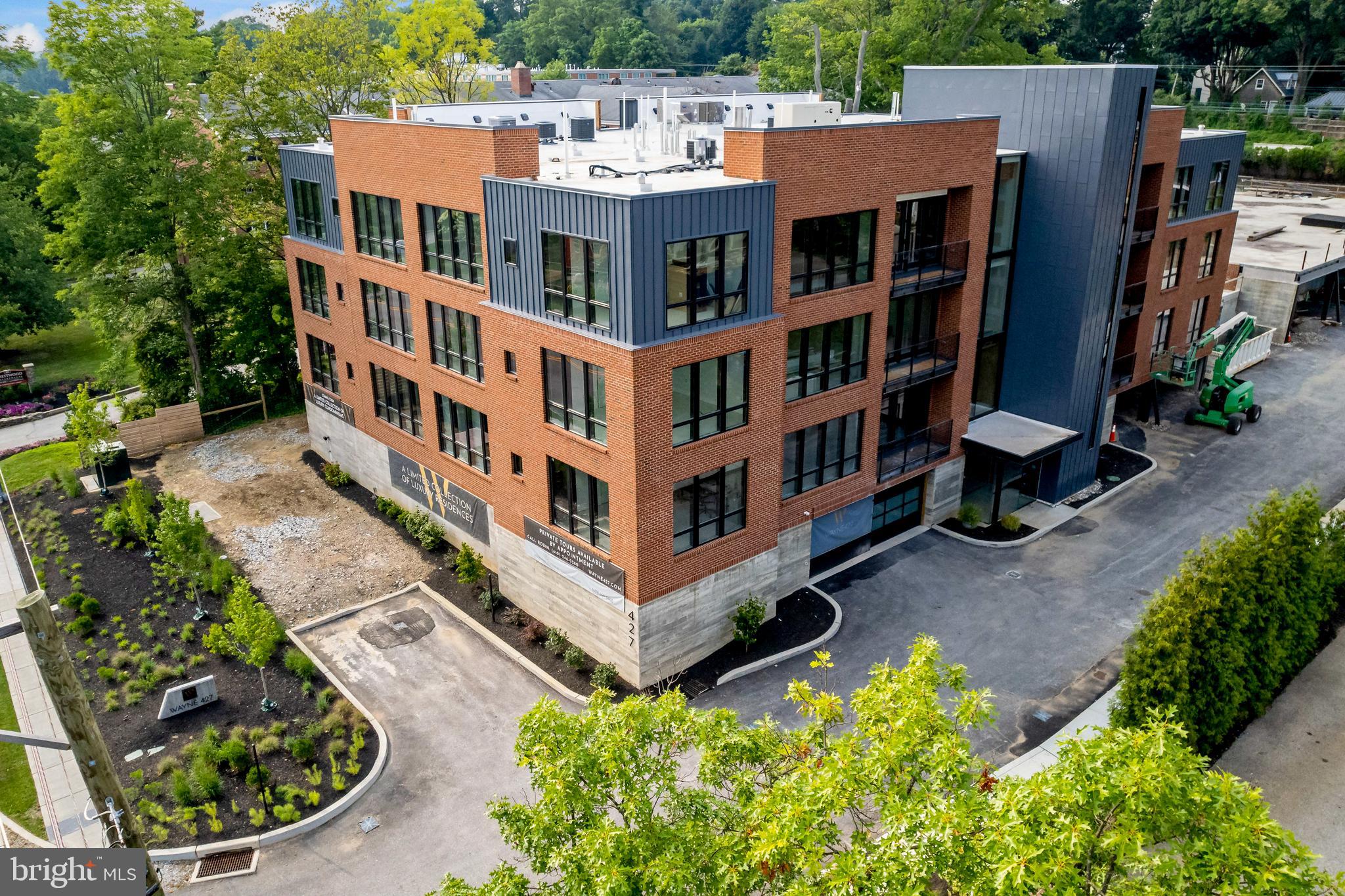 a view of a building with a garden