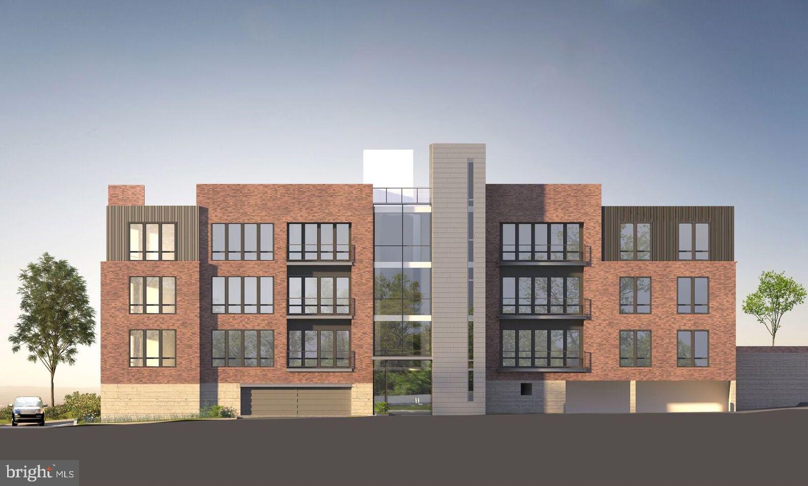 427 Lancaster Avenue, Unit B201 Wayne, PA 19087 - Photo 15 of 18 a front view of a residential apartment building with a street