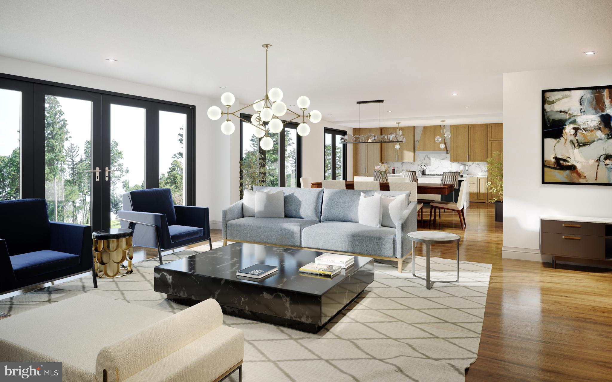 427 Lancaster Avenue, Unit B201 Wayne, PA 19087 - Photo 4 of 18 a living room with furniture and a chandelier