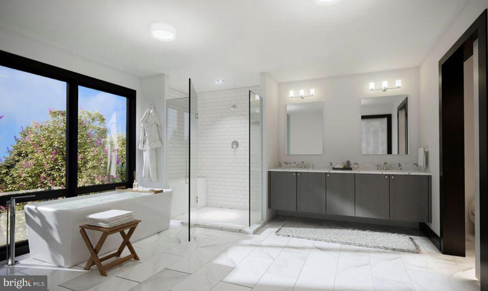 427 Lancaster Avenue, Unit B201 Wayne, PA 19087 - Photo 8 of 18 a bathroom with shower and mirror