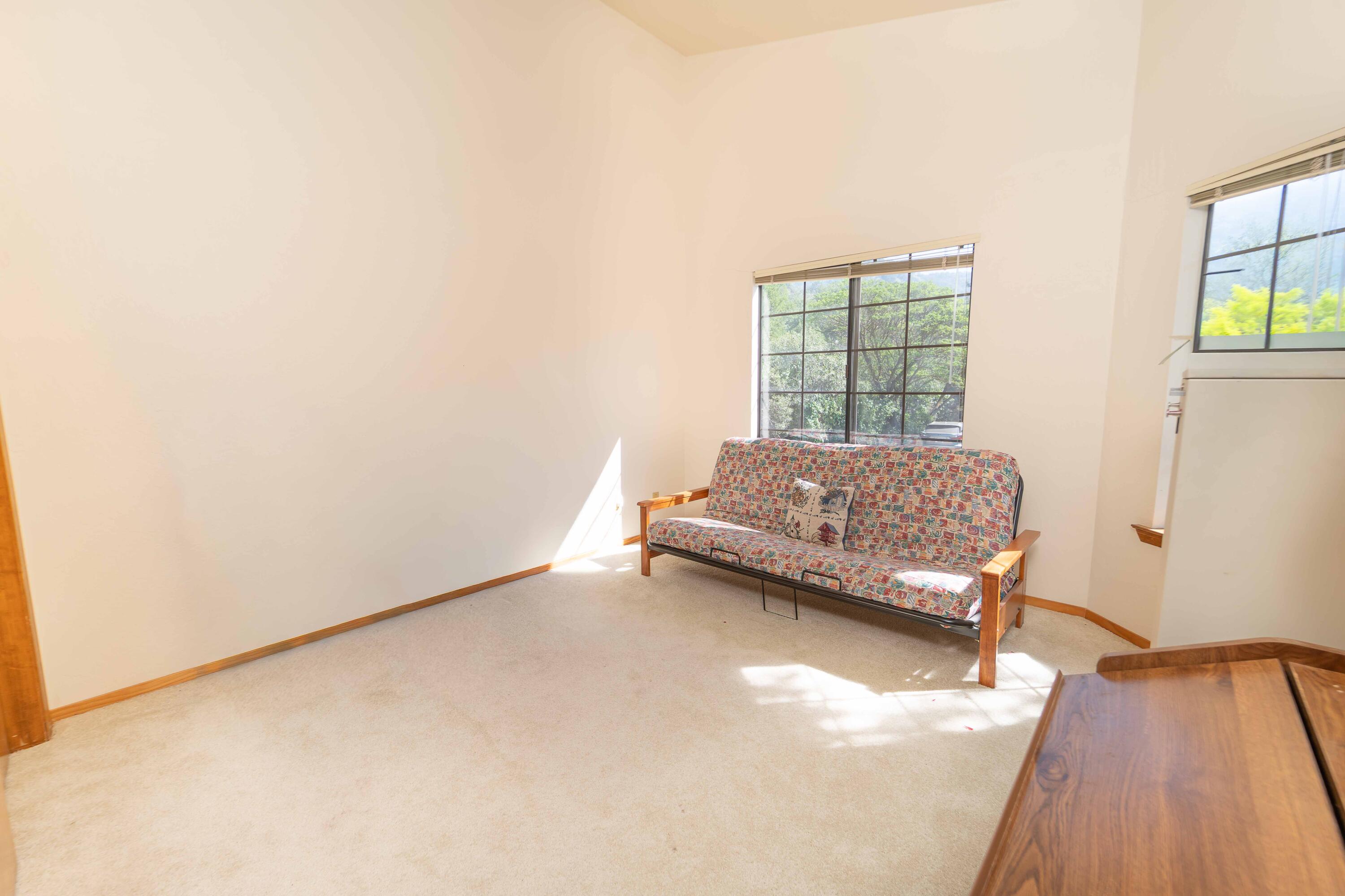 40962 Oak Ridge Drive Three Rivers, CA 93271 - Photo 17 of 36 a room with a bed and a window