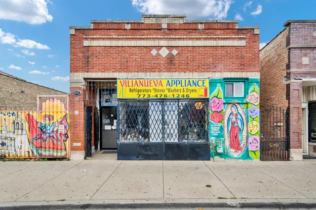 a view of street with large building