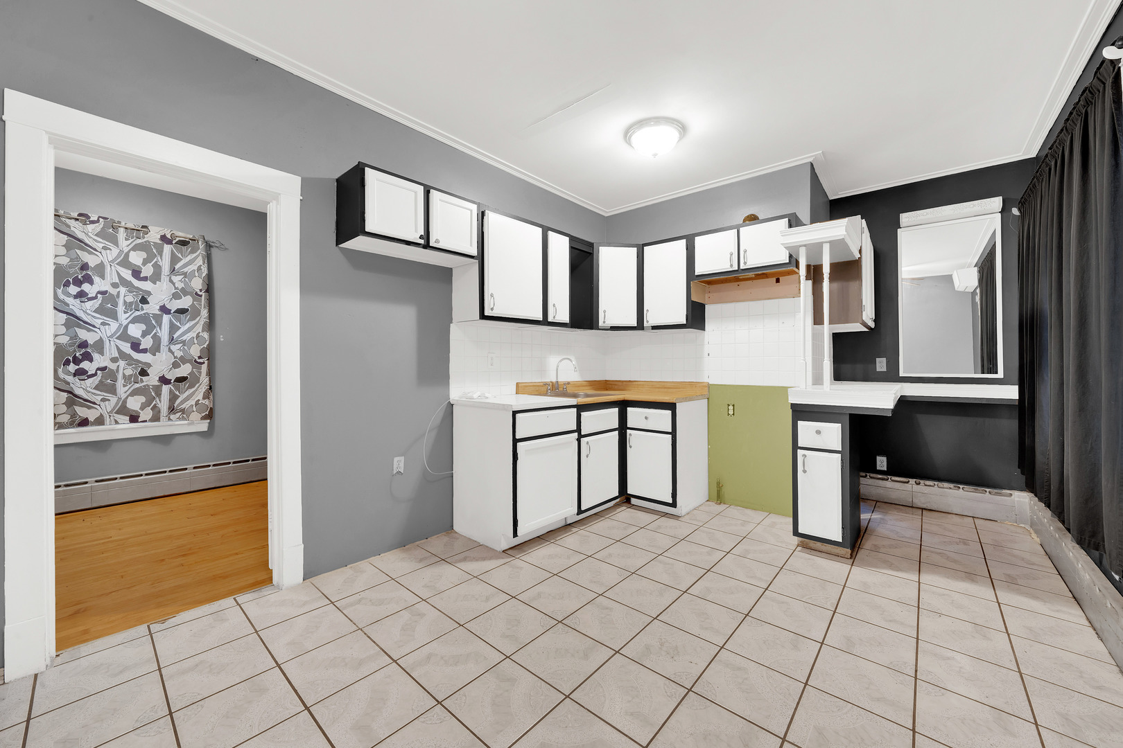 2547 West 51st Street Chicago, IL 60632 - Photo 11 of 19 a kitchen with stainless steel appliances a refrigerator and a stove top oven