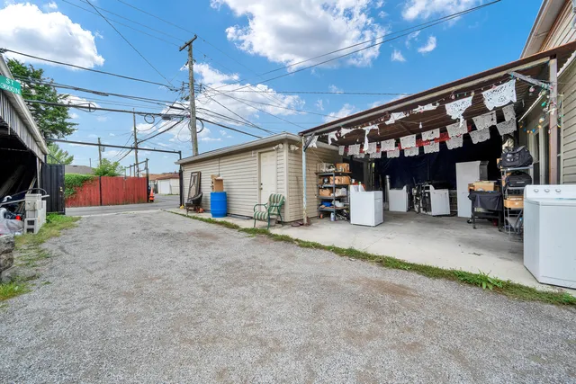 a view of a big room with furniture and a garage