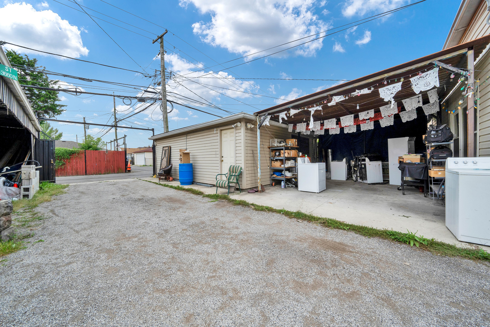 2547 West 51st Street Chicago, IL 60632 - Photo 17 of 19 a view of a storage room with wooden shelves