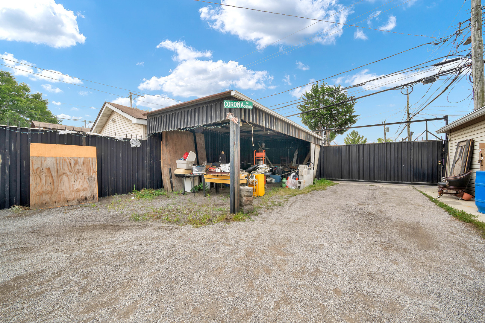 2547 West 51st Street Chicago, IL 60632 - Photo 18 of 19 a view of a house with a patio and a yard