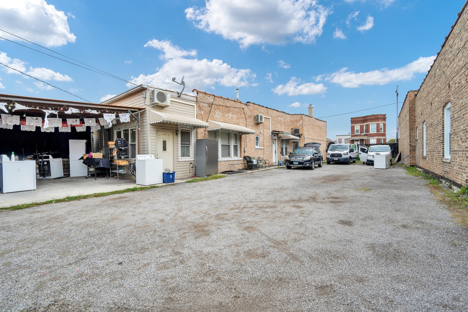 2547 West 51st Street Chicago, IL 60632 - Photo 19 of 19 a view of a big room with furniture and a garage