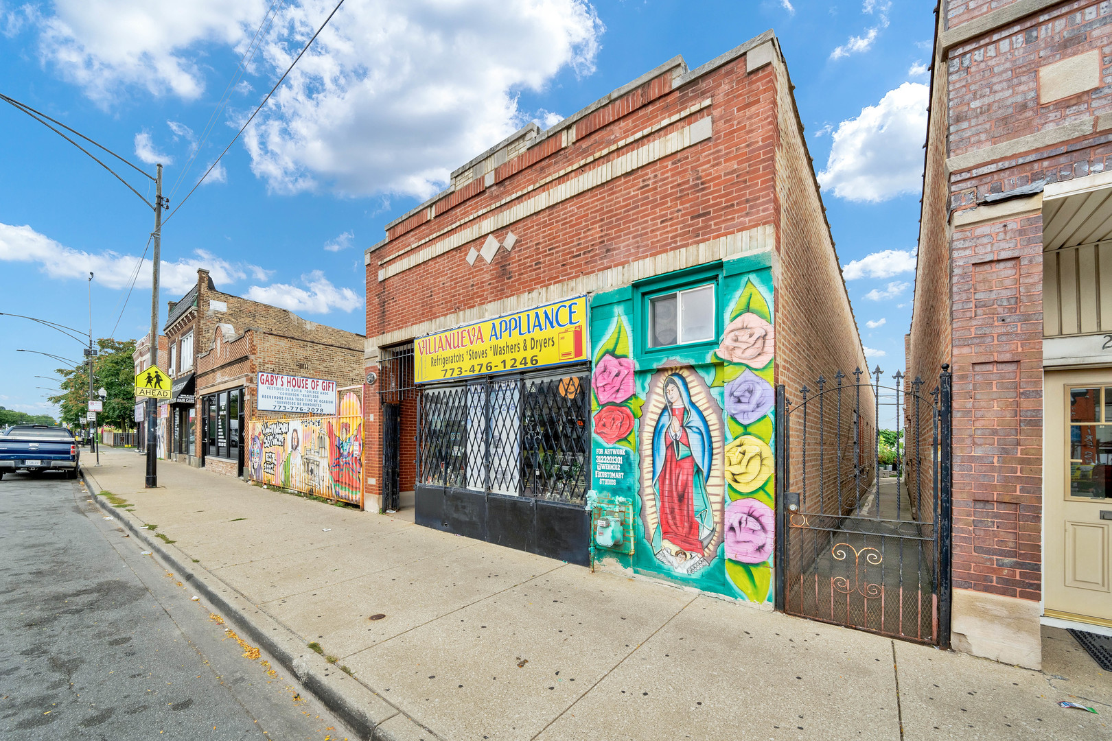 2547 West 51st Street Chicago, IL 60632 - Photo 3 of 19 a view of street with large building
