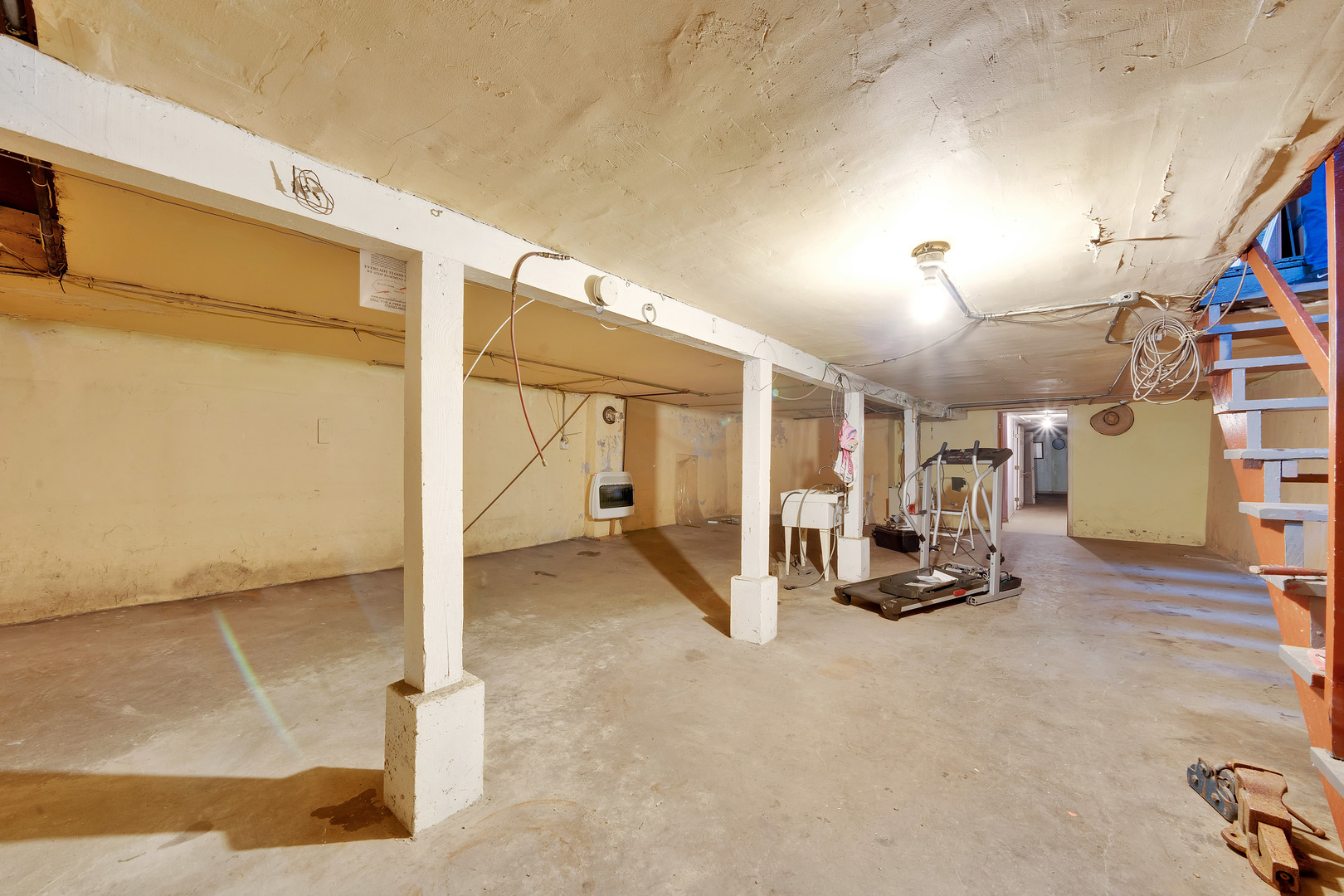 2547 West 51st Street Chicago, IL 60632 - Photo 8 of 19 a view of a big room with air conditioner duct and materials on the wall