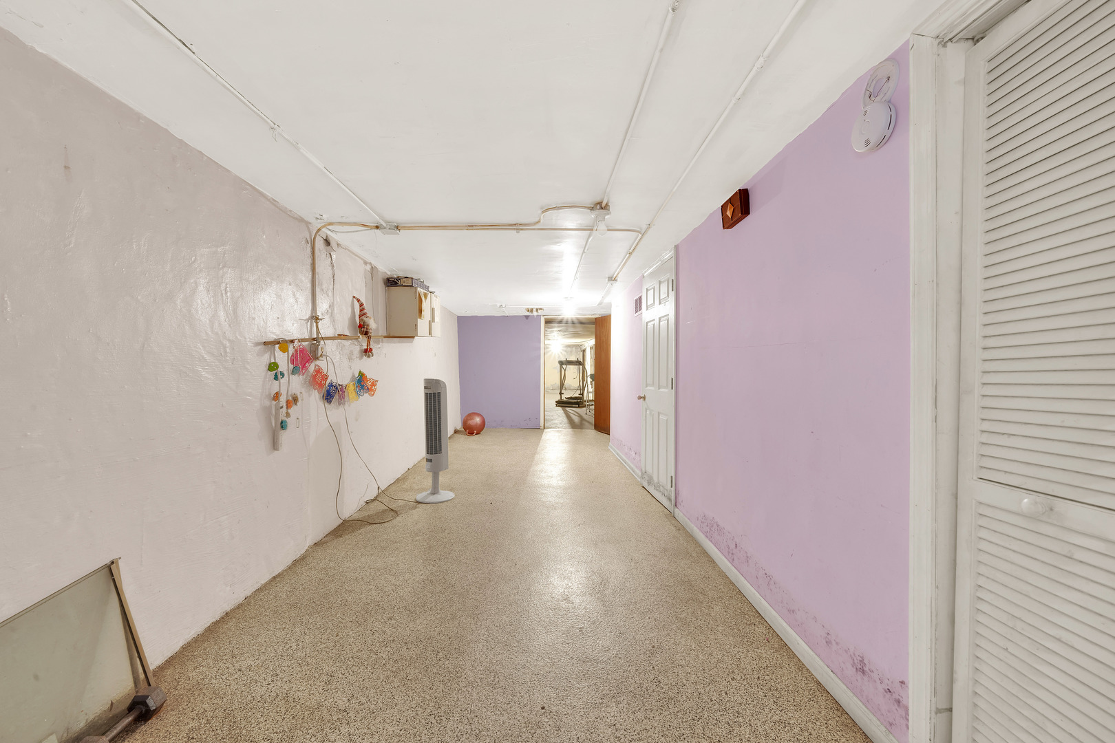 2547 West 51st Street Chicago, IL 60632 - Photo 10 of 19 a view of a hallway with a refrigerator