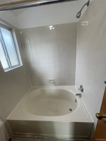 a bathroom with a bathtub