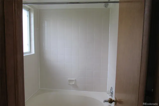 a bathroom with a bathtub