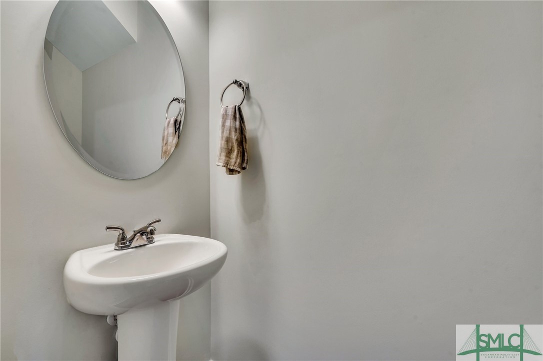 3 Honeysuckle Court Guyton, GA 31312 - Photo 16 of 37 downstairs half bath