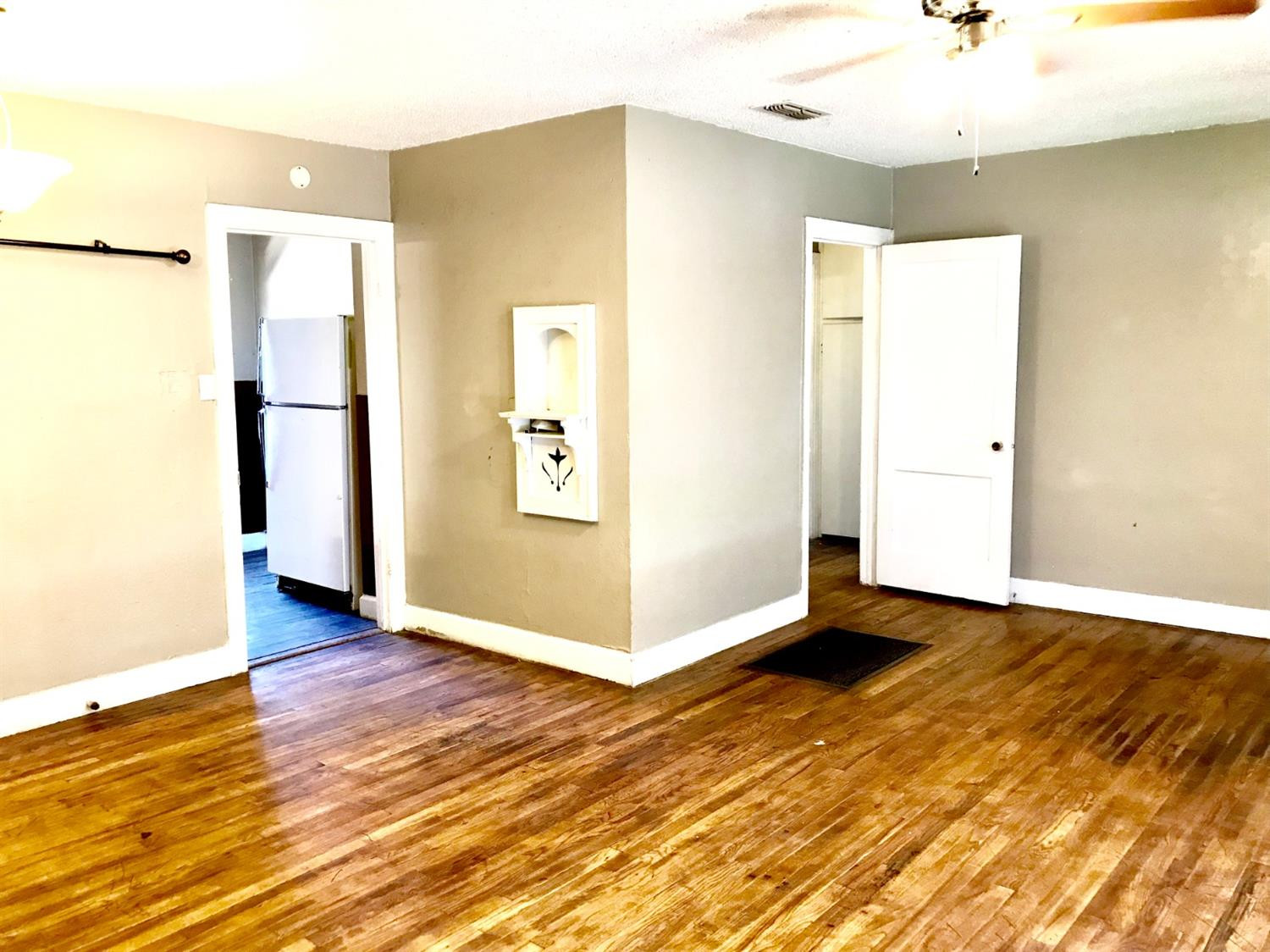 3016 30th Street Lubbock, TX 79410 - Photo 3 of 8 a view of an empty room and window