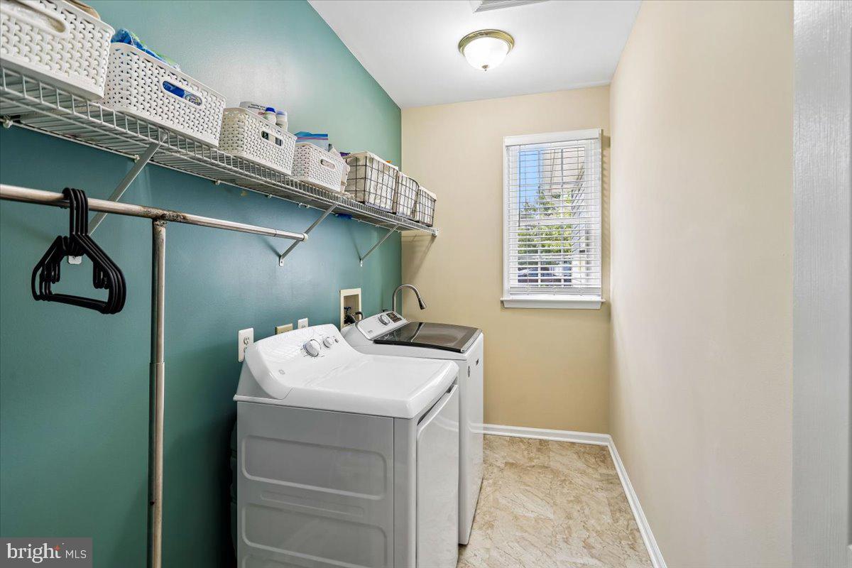 9909 Midsummer Snow Lane Laurel, MD 20723 - Photo 27 of 81 a utility room with dryer and washer