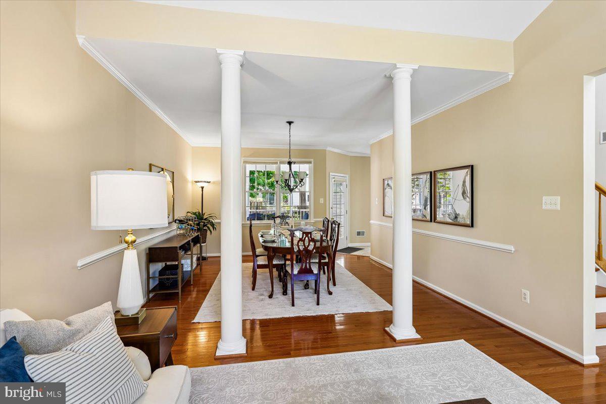 9909 Midsummer Snow Lane Laurel, MD 20723 - Photo 10 of 81 a living room with furniture and a wooden floor